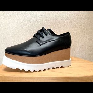 Jessica Buurman Leather and Wood platform